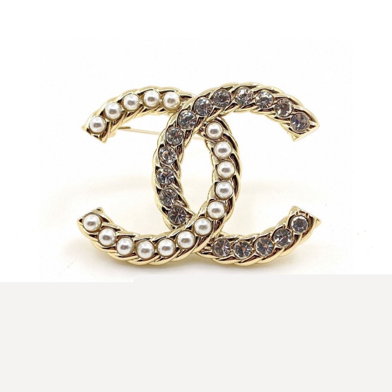 Ch*el brooches